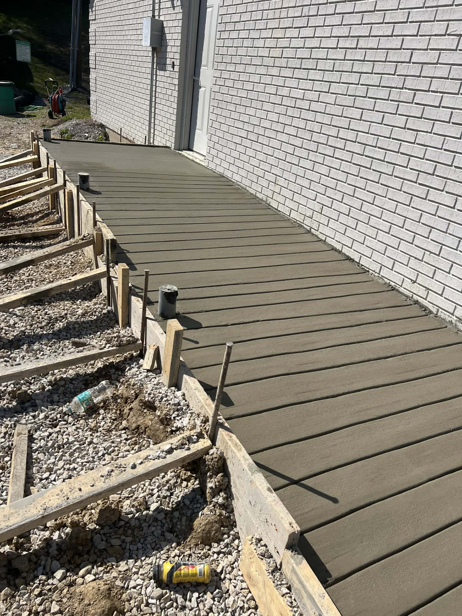 Wood plank stamped concrete walkway