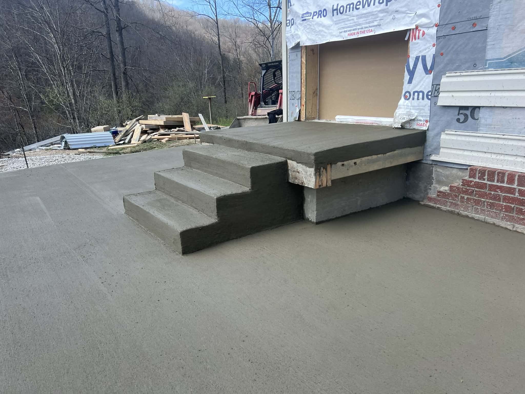 Concrete steps for raised entrance